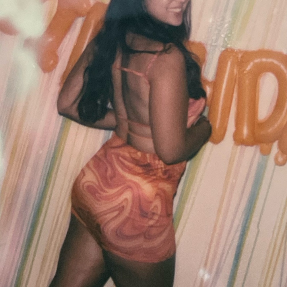 Orange swirl body con dress